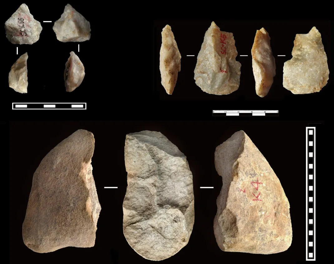 Pieces of a brown rock fashioned into early human tools.